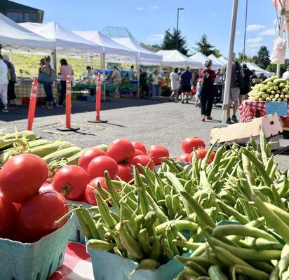 Corn, tomatoes, green beans, vendor tents