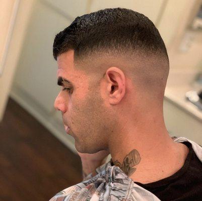 Mid-high bald fade house call for a client