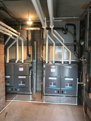 A quality commercial installation requiring 2 sets of "twinned" furnaces with matched two-stage air conditioning systems.