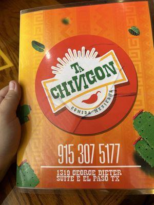 The front of the menu with the address and phone number