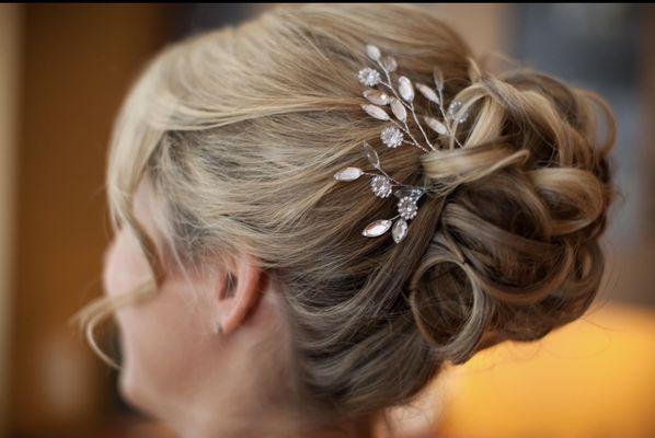 My daughter's wedding day!  Her hair was beautiful and stayed perfectly all evening.