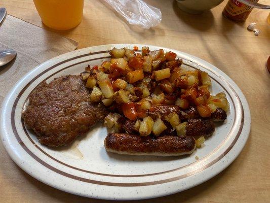 Two types of sausage with fried potatoes