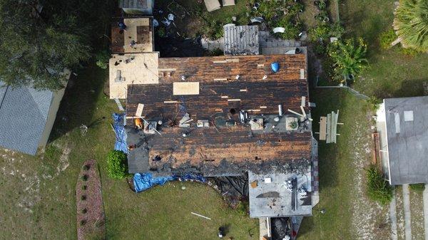 We removed 4 layers of old roof installs and replaced 15 sheets of plywood so this home would be dried in properly.