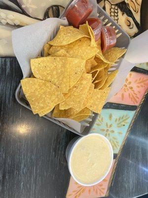 Chips and salsa and queso