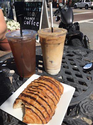 Tea and latte with chocolate croissant