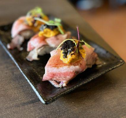 NYC "Big Mac" Nigiri w/ seared A5 wagyu, otoro, uni, black tobiko, truffle ($20 each x3)