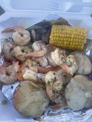 Shrimp Platter with sausage and taters corn setup.