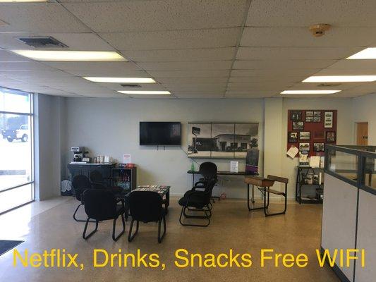 large seating area with Netflix, snacks, drinks, clean restrooms,free wifi, and laptop station