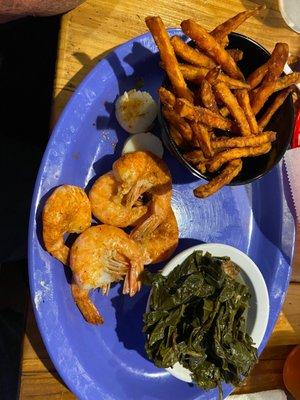 Shrimp, scallops, sweet potato fries, and collard greens