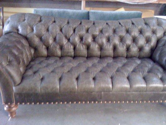 Custom tufted leather sofa