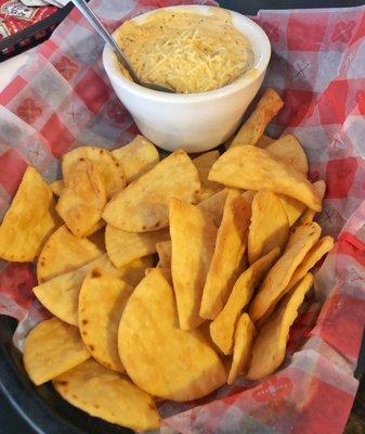 Crab Dip: Lumps of fresh crab meat folded together with cream cheese and served with fried pita bread ($8.99)