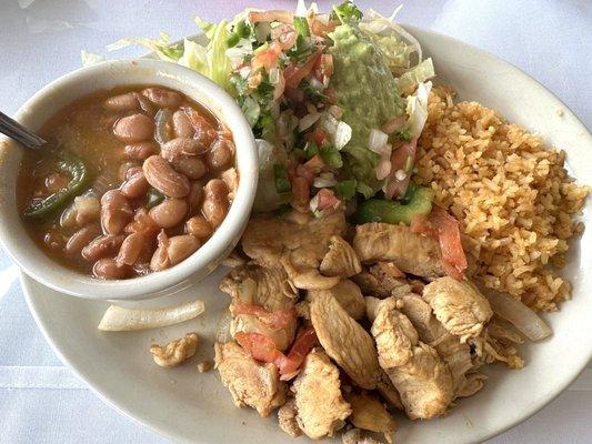 Chicken Fajitas, rice & charro beans.