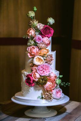 Wedding cake with cascading florals