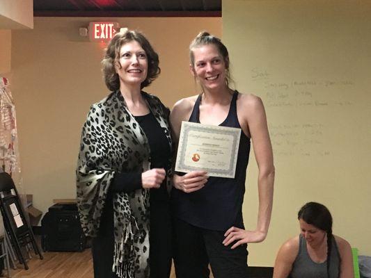 Mary Irby presenting Jennifer with her RYT certificate in April, 2018.