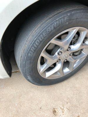 They placed this POS on and took the good tire that looked like below...