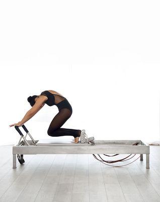 Knee Stretches on the Reformer