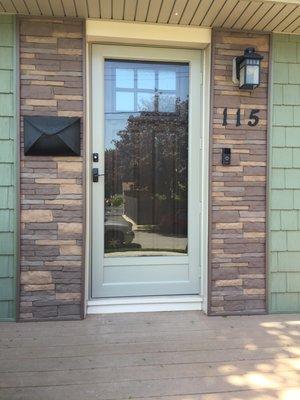 Vinyl Shakes With Vinyl Stone Accenting New Entry And Storm Doors