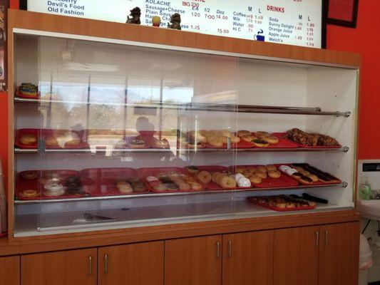 Donut display behind the counter