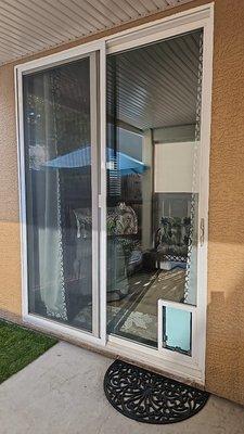 A pet door installed into a patio door in elk grove