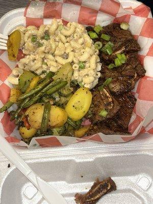 Korean short ribs , mixed veggies with macaroni salad