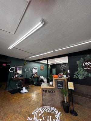 Interior/entrance of Loyalty Barber Shop VII