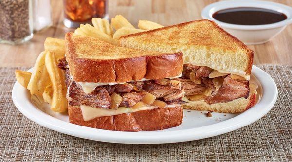 Stock photo of the Big Dipper Pot Roast sandwich and fries