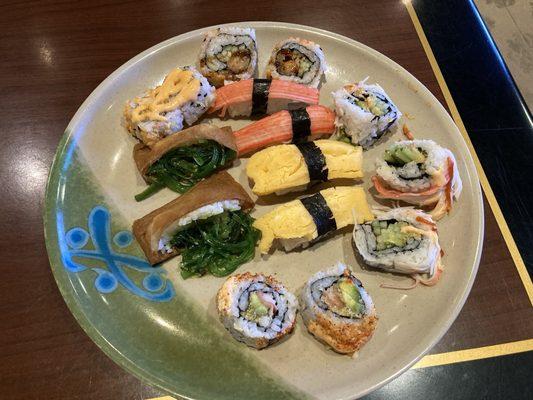 my plate of a variety of cooked sushi