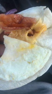 bacon egg and cheese wake up wrap. gross. cheese not melted. ew.