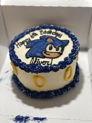 6 inch Strawberry Sonic the Hedgehog cake with Buttercream icing.