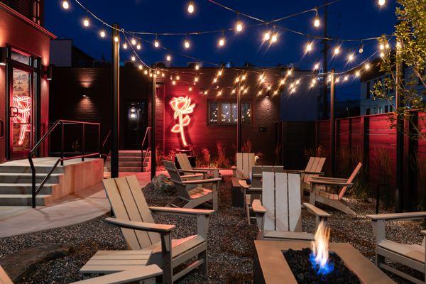 Outdoor patio available for hotel guests, equipped with fire pits.