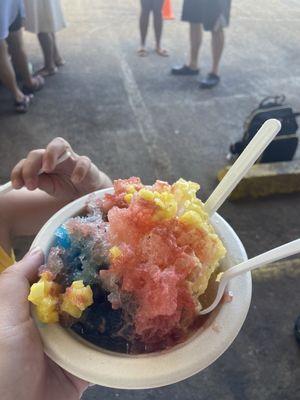 "Rainbow" shaved ice with pineapple chunks, strawberry purée, pineapple purée, and blue vanilla. Delicious!