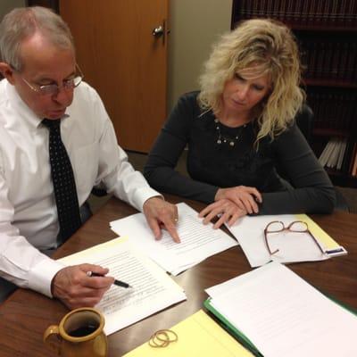 Jean Owen and Andrea Wehner reviewing an argument for a case