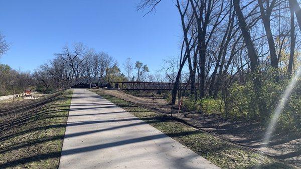 View of the trail leading up to the bridge on the Raccoon River side.