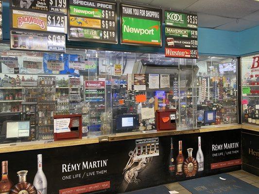 Interior of store. 180 degrees of plexi. They also have a drive through.