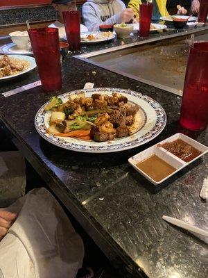 Hibachi steak and chicken.  Also included two shrimp.  Double veggie no rice