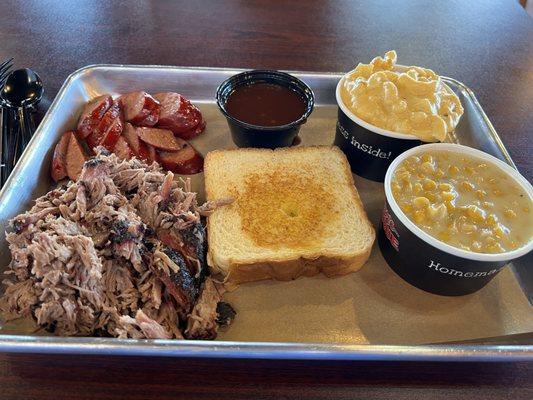 Chopped brisket, hot sausage, Mac and cheese, cream corn