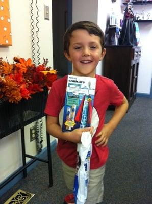 Thanks Sam for starting our Holiday Raffle off with a smile. We are giving away a Sonicare toothbrush and a Violight Sanitizer on 12/22/15.