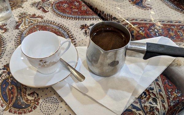 Turkish Coffee with enough to fill the cup almost 3 times