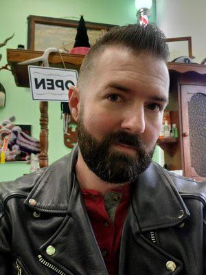 Freshly cut with a fade and beard trim