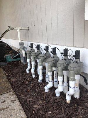 Install new irrigation anti-siphon valves