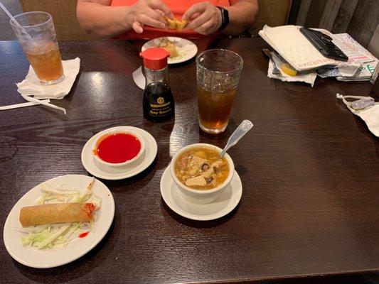 Egg roll, hot & sour soup and ice tea