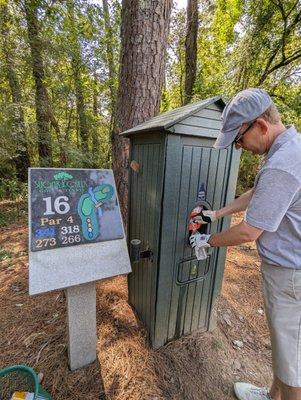 Hole 16 marker. Several water coolers were located throughout the course. Much needed and appreciated.