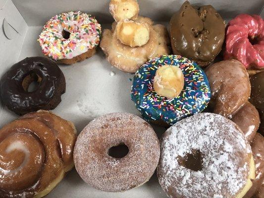 One dozen donuts for $16 with a couple donut holes for fun. My coworker ate one before I could take this picture, hence the space void.