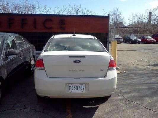 USPS employees park in the customer parking lot.