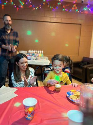 Birthday boy! The tables/chairs and plates/cups/table coverings are all included in the party package.