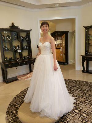 Trying on an airy, simply, and fairytale dress at Elizabeth Johns.