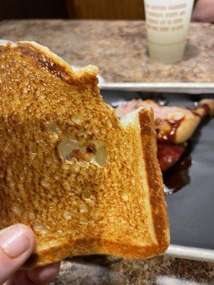 The toasted side of the white bread they call Texas Toast.