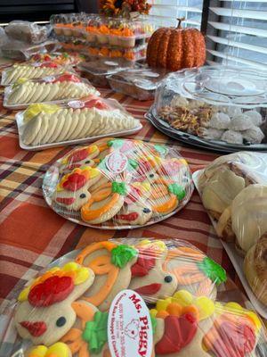 Thanksgiving style cookies and trays including cookies, cinnamons rolls, decorating kits and more!