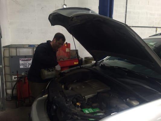 Dan working on an oil change.