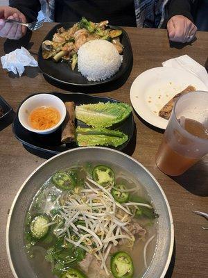 Rare steak, brisket pho and shrimp with vegetables and rice.